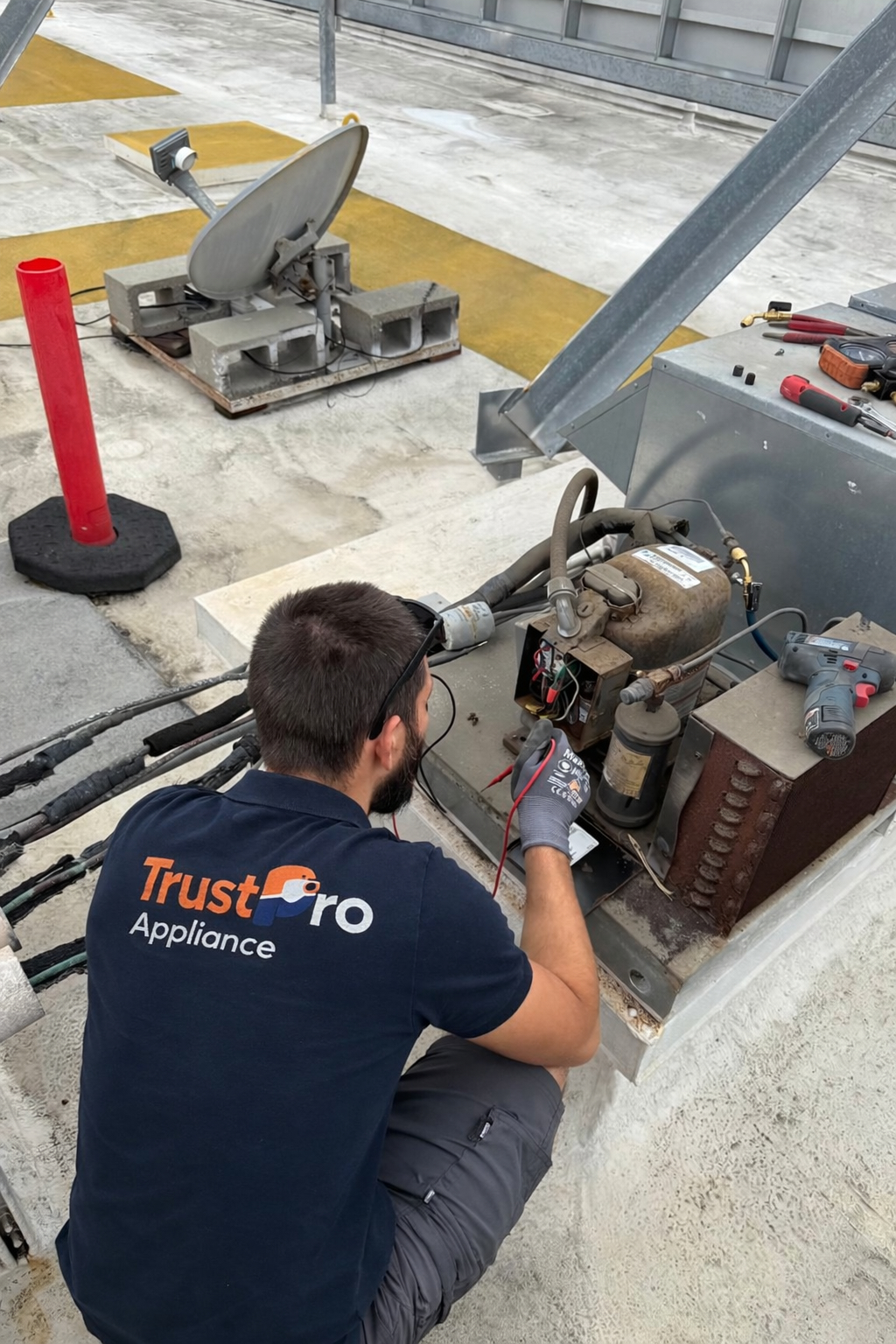 Trust Pro technician servicing Trane HVAC system